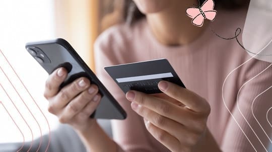 Woman holding highest limit credit cards in Canada