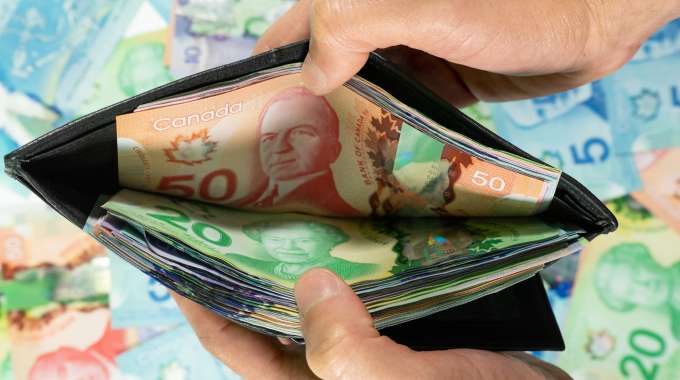 Wallet full of Canadian dollars