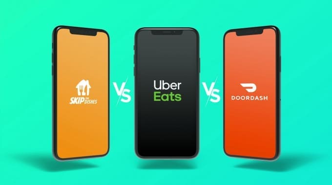 3 smartphones displaying 3 different food delivery apps