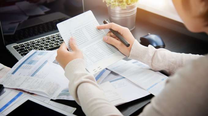 Person examining income assistance options after CERB ends